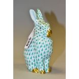 A HEREND GREEN FISHNET FIGURE OF A SEATED RABBIT, model no. 5327, pale blue ears, gilt nose, mouth