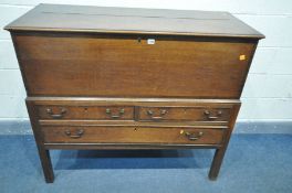 A GEORGIAN OAK AND MAHOGANY CROSSBANDED MULE CHEST ON STAND, with two short and one long drawer,