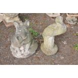 A COMPOSITE GARDEN ORNAMENT OF A FOX and its offspring together with an ornamental figure of a