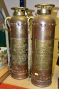 A PAIR OF COPPER EMPIRE FIRE EXTINGUISHERS, model number 2-c, manufactured by John Kerr & Co of