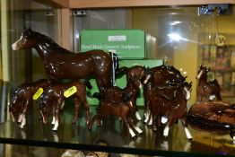 ELEVEN BESWICK AND ROYAL DOULTON HORSES AND FOALS, a New Forest Pony, first version model no.1646,