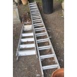 A 4M DOUBLE EXTENSION ALUMINIUM LADDERS together with a set of step ladders and a quantity of garden