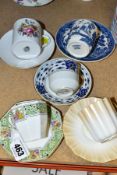 FIVE ASSORTED COFFEE CUPS AND SAUCERS, comprising a Royal Doulton octagonal example with printed and