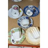 FIVE ASSORTED COFFEE CUPS AND SAUCERS, comprising a Royal Doulton octagonal example with printed and