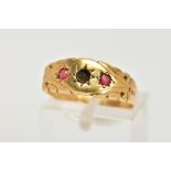 A LATE 19TH CENTURY GOLD RING, a band ring with scroll detailing set with two red circular cut