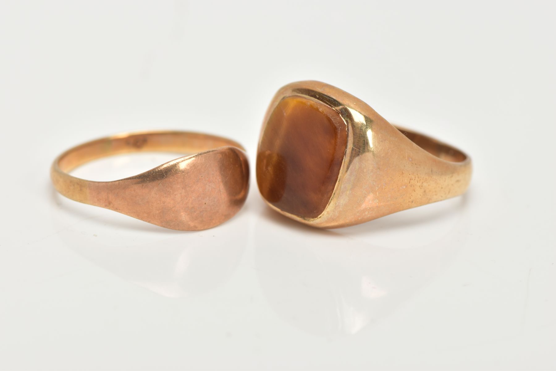 A 9CT GOLD TIGERS EYE SIGNET AND YELLOW METAL SIGNET, a large signet ring set with a squared - Image 2 of 3