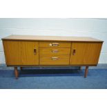 A SCHREIBER TEAK EFFECT SIDEBOARD, with three graduating drawers flanked by two cupboard doors,