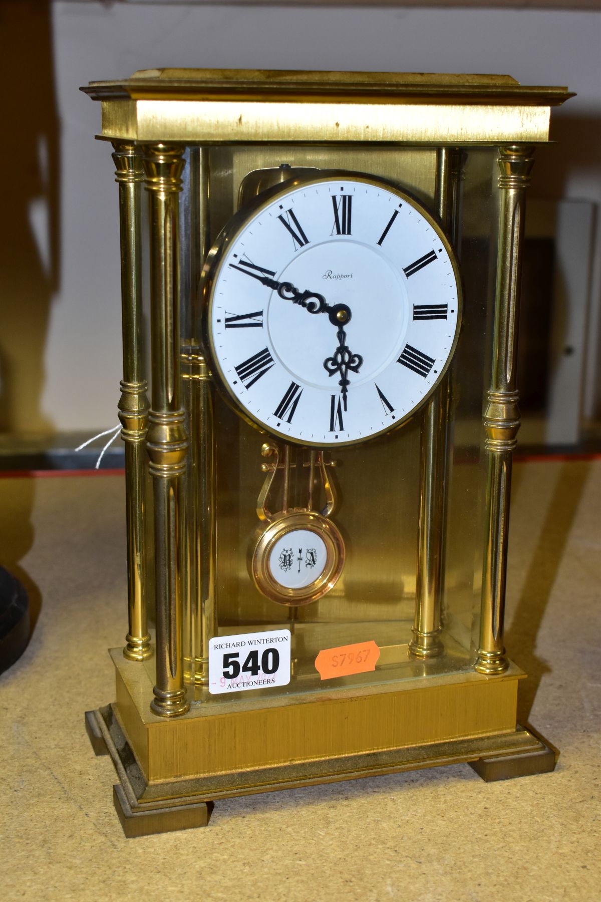 A MECHANICAL RAPPORT CHIMING MANTLE CLOCK, the white dial has Roman numeral hour markers, the case