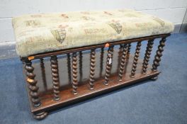 A VICTORIAN MAHOGANY RECTANGULAR WINDOW SEAT, later covered hinged lid, on barley twist supports, on