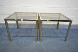A PAIR OF BRASS OCCASIONAL TABLES, with grey frosted glass inserts, 60cm squared x height 50cm