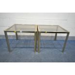 A PAIR OF BRASS OCCASIONAL TABLES, with grey frosted glass inserts, 60cm squared x height 50cm