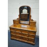 A VICTORIAN BURR WALNUT DRESSING CHEST, with a single mirror, supported by winged supports, one with