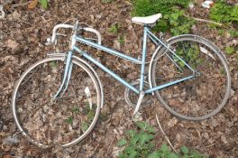 A LIGHT BLUE RALEIGH IMPULSE LADIES ROAD BIKE, with a 21 frame