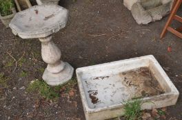 A COMPOSITE OCTAGONAL BIRD BATH on a separate bulbous support and octagonal plinth, diameter 47cm