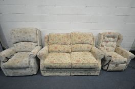 A MATCHED FLORAL UPHOLSTED THREE PIECE SUITE, comprising a sofa bed, a HSL electric rise and recline