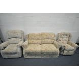 A MATCHED FLORAL UPHOLSTED THREE PIECE SUITE, comprising a sofa bed, a HSL electric rise and recline