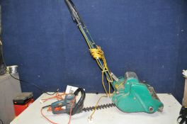 A VINTAGE QUALCAST ELECTRIC CYLINDER MOWER and a Bosch hedge trimmer (both PAT fail due to