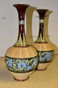 A PAIR OF DOULTON LAMBETH STONEWARE VASES OF ONION FORM, mottled brown, buff, green and blue glazes,