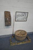 AN ANTIQUE ELM WALL UNIT, along with an oval wicker log basket, brass extending fender, copper