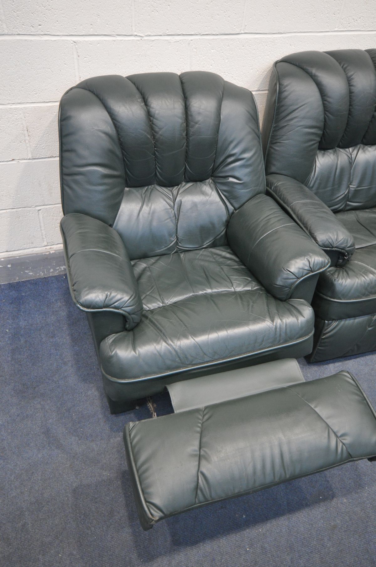 A PAIR OF GREEN MANUAL RECLINER ARMCHAIRS, (condition - surface marks and cracks) - Image 2 of 2