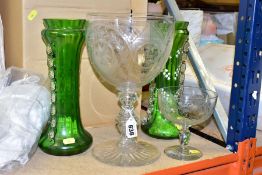 ANTIQUE GLASS COMPRISING AN OVERSIZED WINE GOBLET, the bowl decorated with star motifs and a swag of