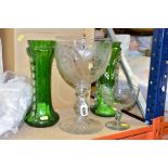 ANTIQUE GLASS COMPRISING AN OVERSIZED WINE GOBLET, the bowl decorated with star motifs and a swag of