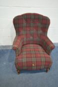 A TARTAN UPHOLSTERED SPOONBACK ARMCHAIR (recently re-upholstered but is within the fire regulation