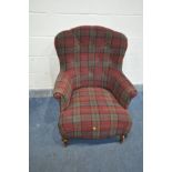 A TARTAN UPHOLSTERED SPOONBACK ARMCHAIR (recently re-upholstered but is within the fire regulation