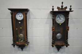 A LATE 19TH CENTURY WALNUT VIENNA WALL CLOCK, half turned fluted pillars to the door, enclosing an