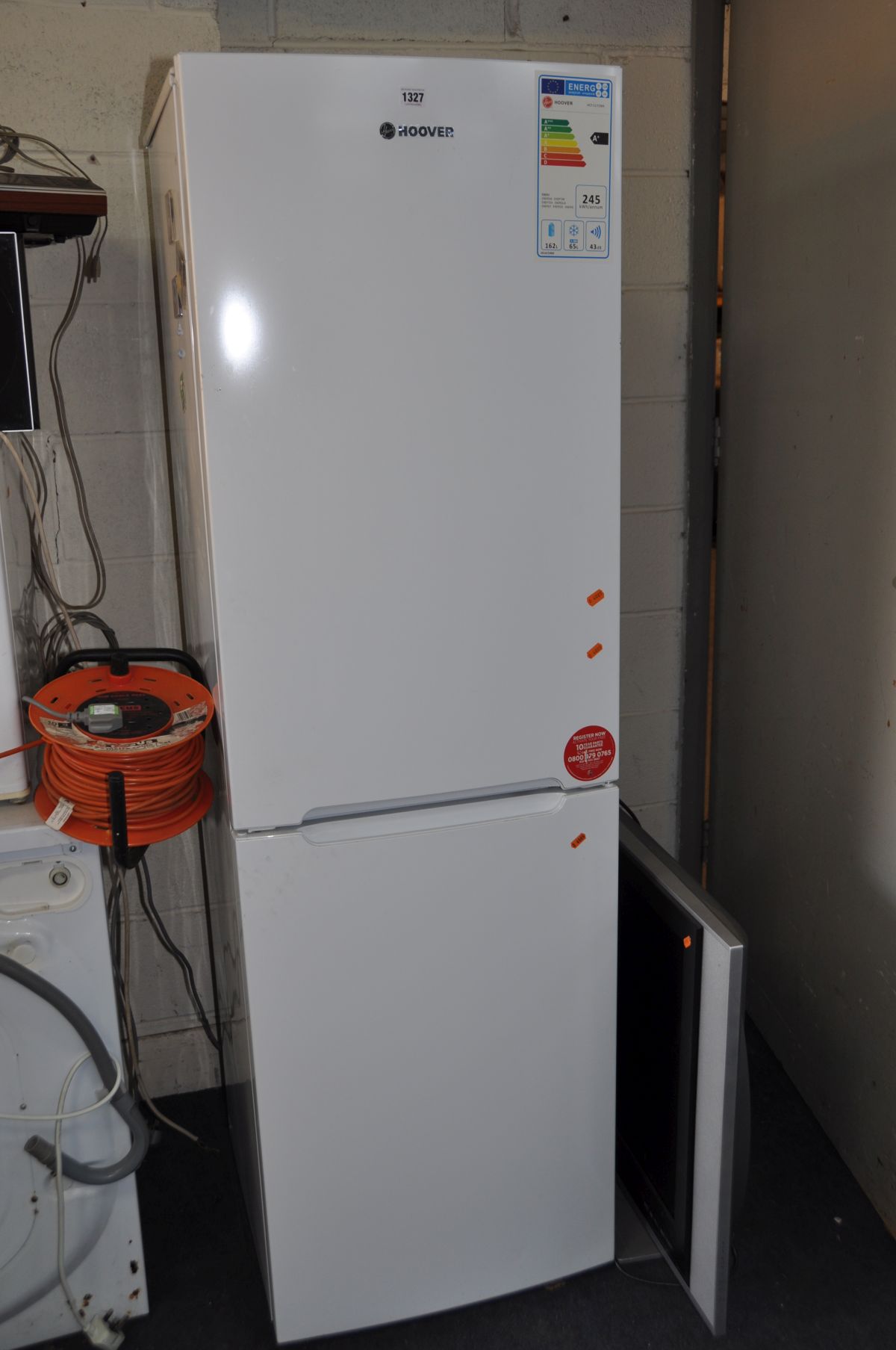 A HOOVER HCF 5172WK FRIDGE FREEZER width 55cm, depth 55cm and height 177cm (PAT pass and working