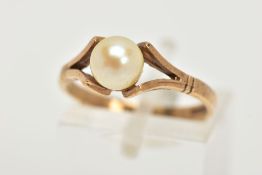 A 9CT GOLD CULTURED PEARL DRESS RING, designed as a single cultured pearl with yellow gold