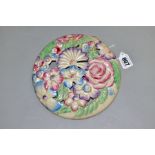 A CLARICE CLIFF WILKINSON LTD CIRCULAR BOUQUET WALL PLAQUE, relief moulded with pastel colour