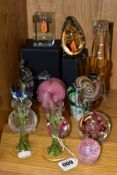A GROUP OF PAPERWEIGHTS AND OTHER GLASSWARES, to include a pair of candlesticks with green applied