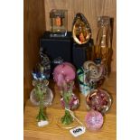 A GROUP OF PAPERWEIGHTS AND OTHER GLASSWARES, to include a pair of candlesticks with green applied