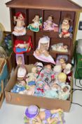 A COLLECTION OF SHERRY RAWN AND OTHER COLLECTABLE BABY DOLLS, to include an open fronted wooden