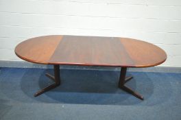 A 1960'S DANISH STYLE HARDWOOD EXTENDING DINING TABLE, with two additional leaves, extended length