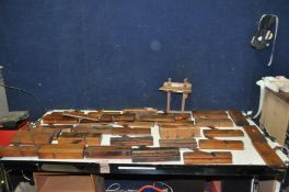 A COLLECTION OF THIRTY TWO VINTAGE WOODEN MOULDING AND PLOUGH PLANES including Rebate, round over,