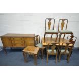 A LATE 20TH CENTURY WALNUT DINING SUITE, comprising an extending dining table, one additional