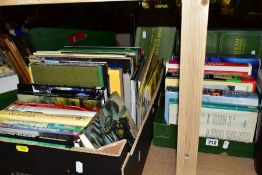 THREE BOXES OF BOOKS AND DVDs, a collection of railway related titles, dictionaries, novels and