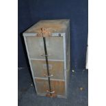 A THREE DRAWER METAL FILING CABINET with adapted bar to secure drawers width 47cm, depth 63cm and