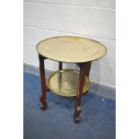 A INDIAN BRASS FOLDING OCCASIONAL TABLE with two brass trays