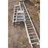 A 3.5M DOUBLE EXTENSION ALUMINIUM, together with two other step ladders (3) (condition:-paint