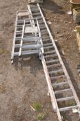 A 3.5M DOUBLE EXTENSION ALUMINIUM, together with two other step ladders (3) (condition:-paint