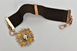 A LATE 19TH CENTURY 9CT GOLD AND RIBBON ALBERTINA, a 9ct gold medalion in the shape of a Maltese