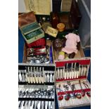 THREE BOXES OF SUNDRY ITEMS, METAL WARE, ETC, to include a distressed child's doll, three cutlery
