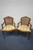 A PAIR OF REPRODUCTION FRENCH STYLE OPEN ARMCHAIRS, with bergère back and gold stripped upholstery