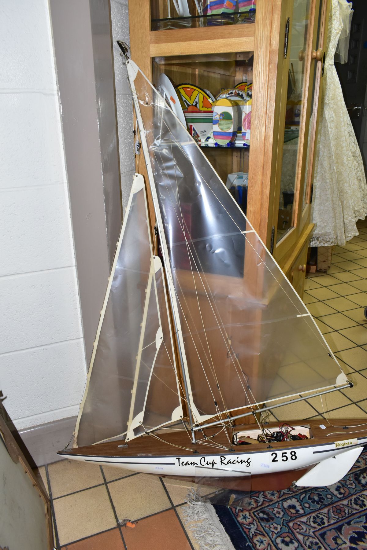 A SCRATCH BUILT MODEL YACHT, at full sail, the deck with rigging and clear sails, motor in hull, - Image 2 of 8