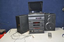 A JVC DR-E53L HI FI with a XL-E34 CD player, an AL-E34 turntable (doesn't turn), a pair of