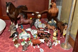 A GROUP OF BESWICK ANIMAL AND BIRD FIGURES, MANY PIECES WITH DAMAGE, including a Hereford calf,