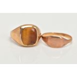 A 9CT GOLD TIGERS EYE SIGNET AND YELLOW METAL SIGNET, a large signet ring set with a squared